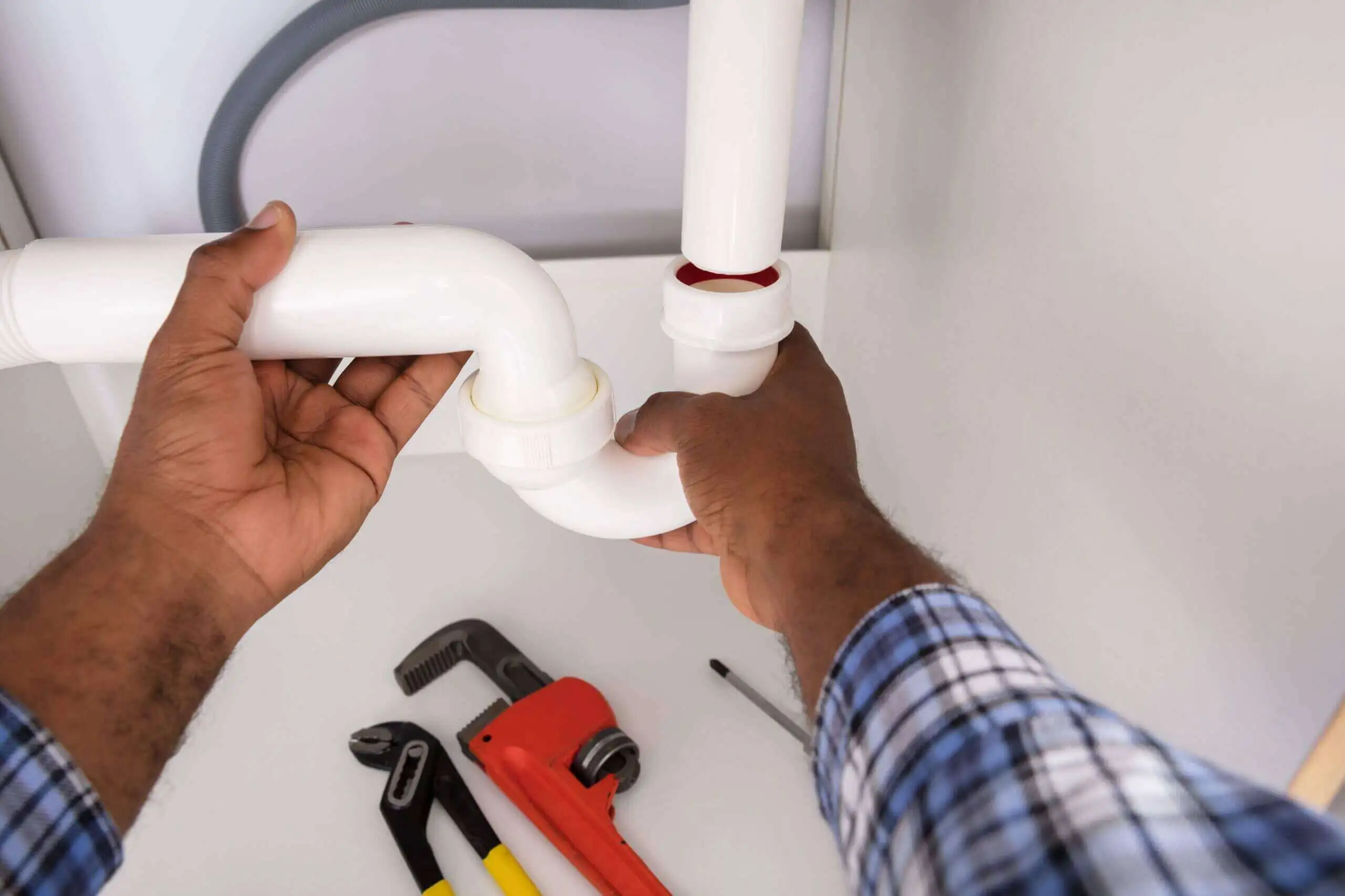 Should I Hire a Plumber to Change My Drain Trap?